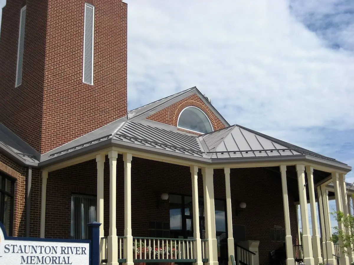 Skilled roofing craftsmen working on a residential roof in Westhaven